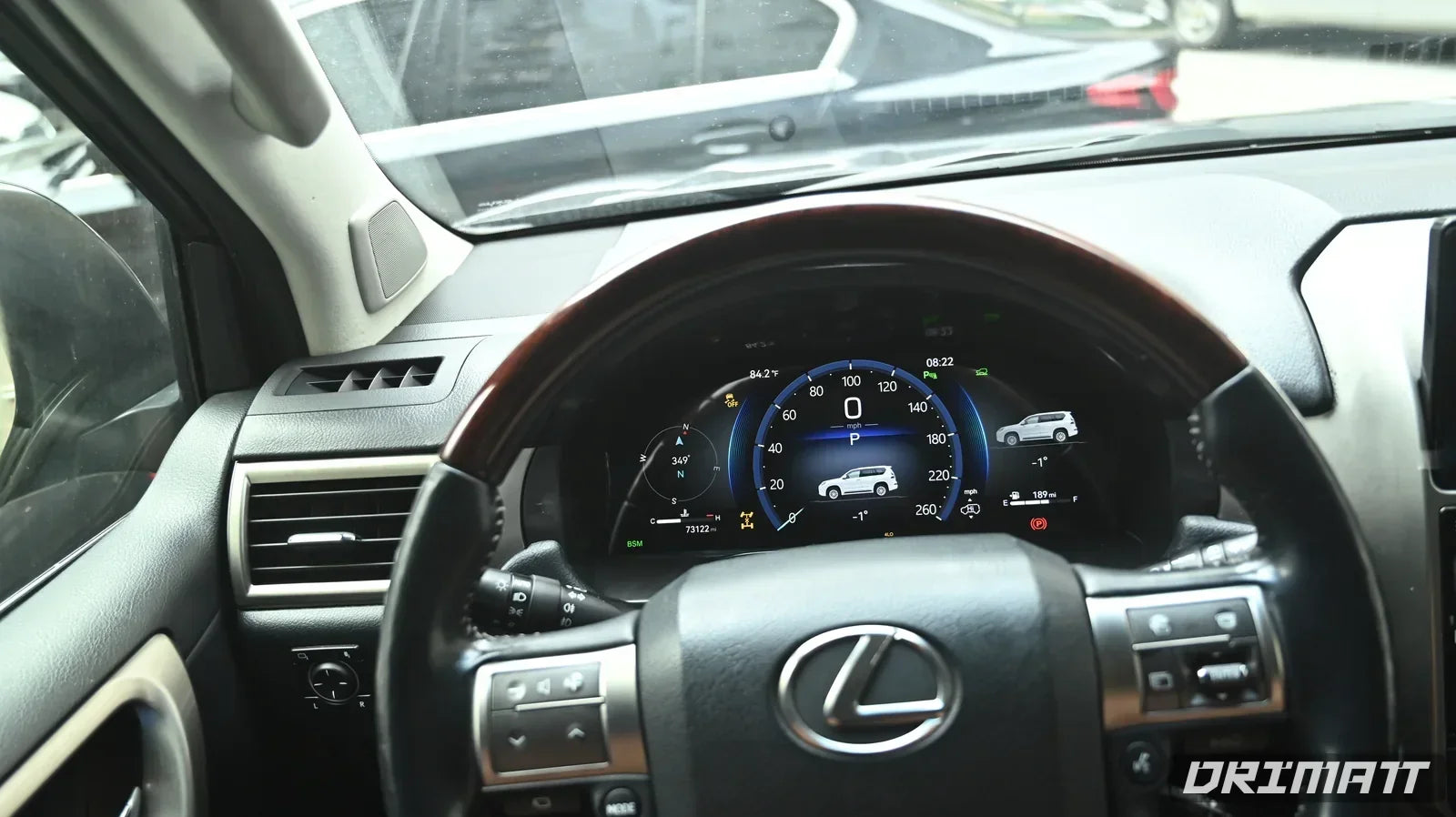 Drimatt digital instrument cluster installed behind the steering wheel of a Lexus GX460